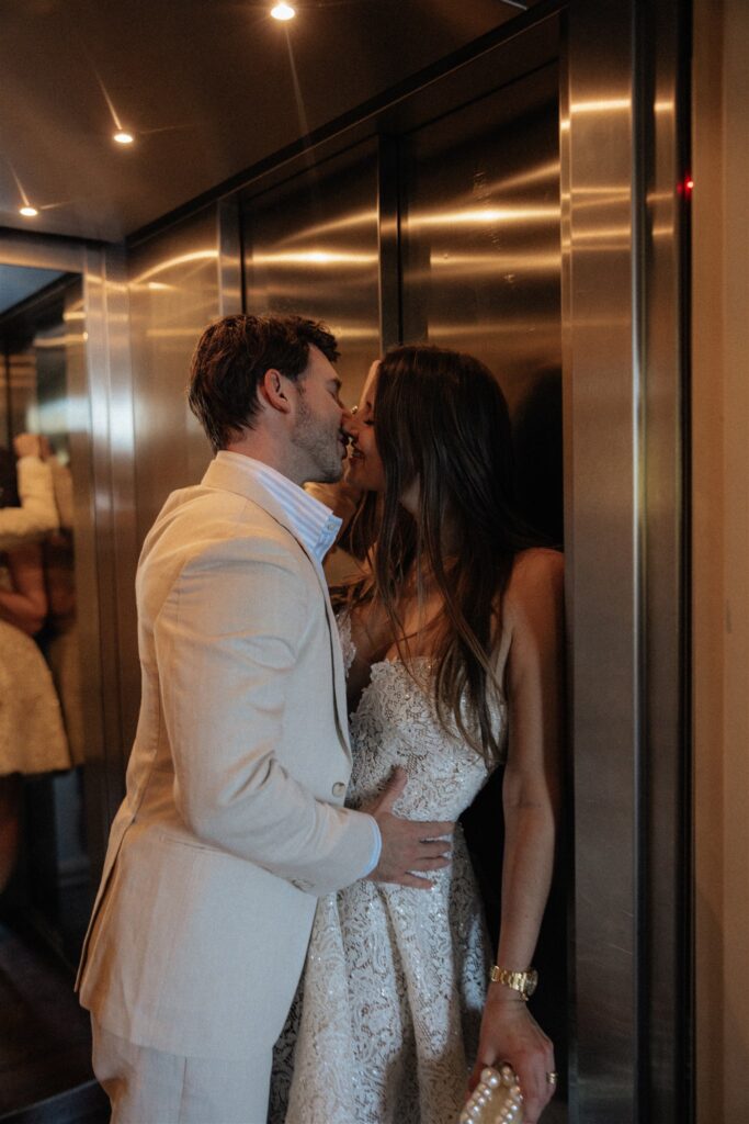 portrait of the newly engaged couple kissing 