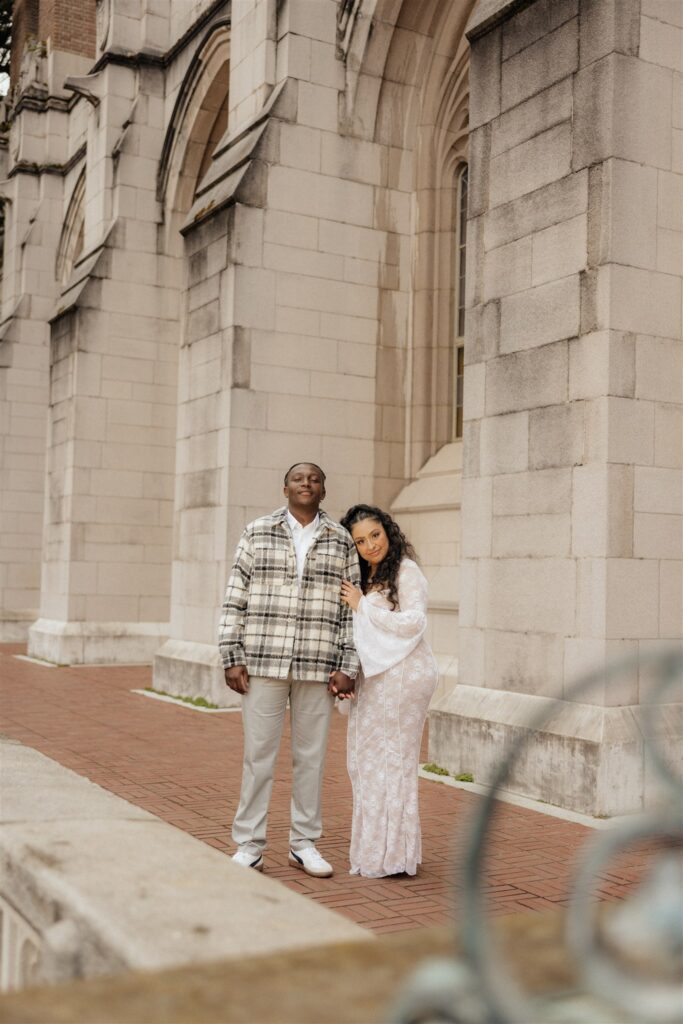 couple smiling at the camera during their session
