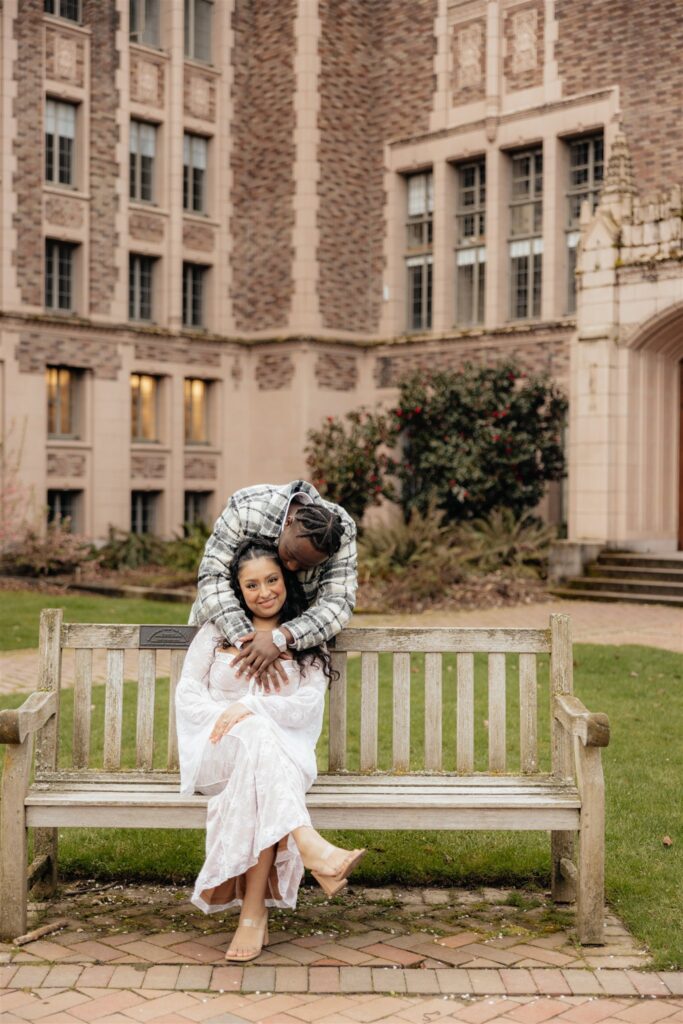fiance kissing his fiance on the cheek