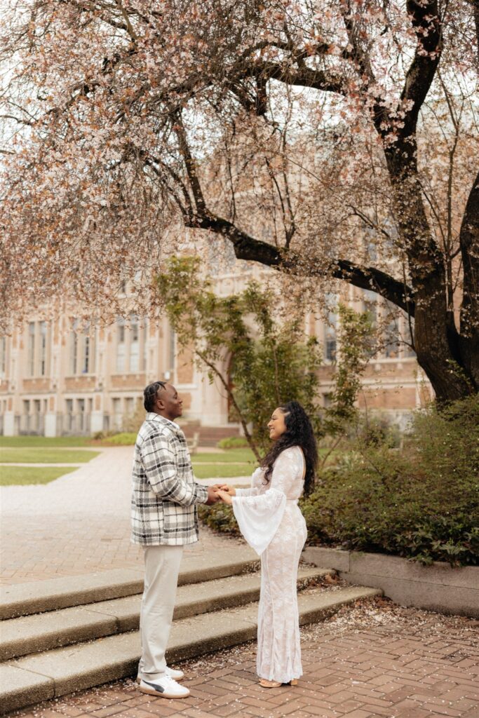 cute picture of the couple laughing with each other during their session