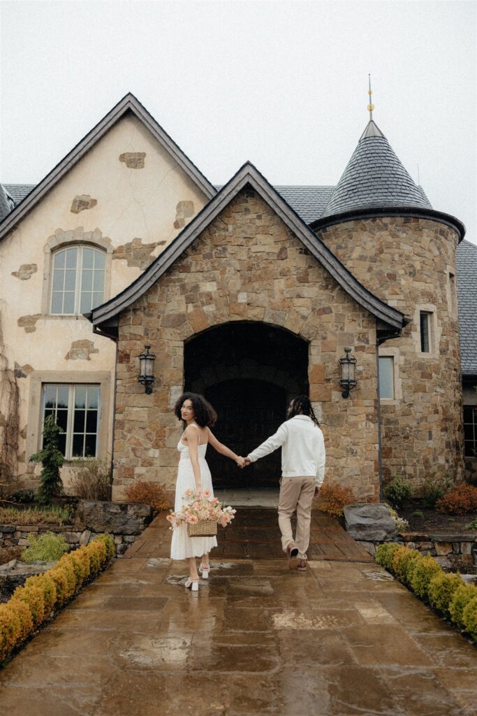 couple walking around their engagement location during their session