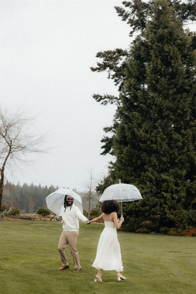newly engaged couple dancing during their session