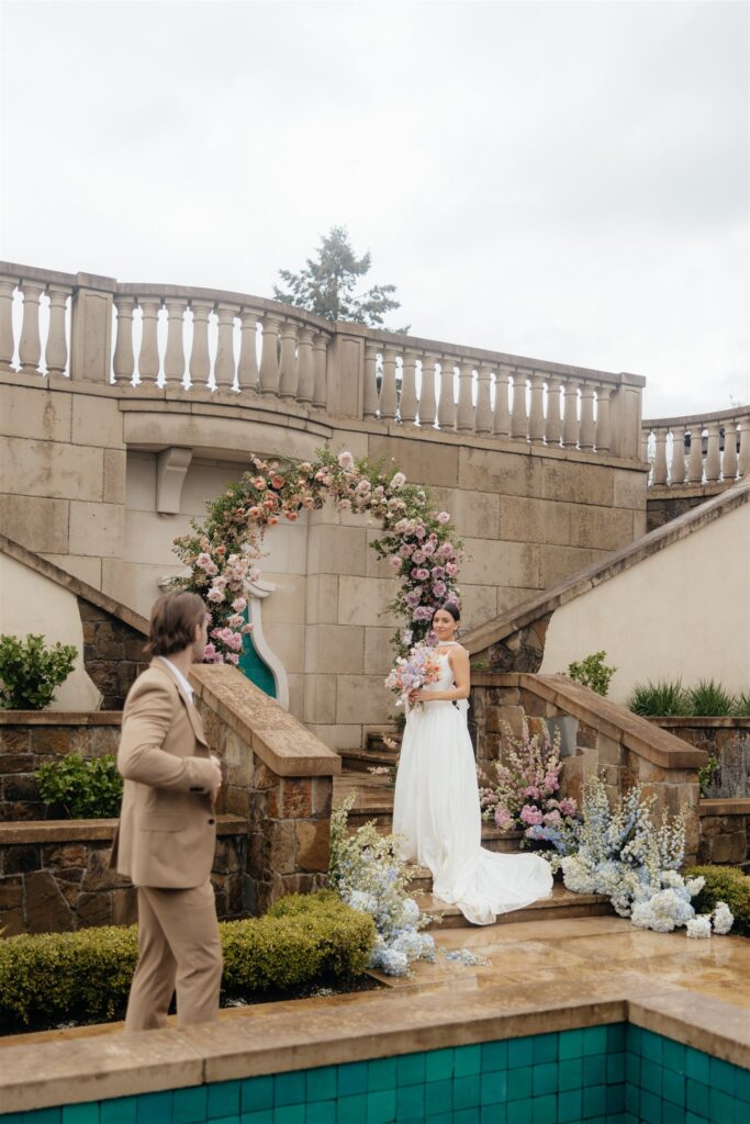 cute picture of the groom  admiring the bride