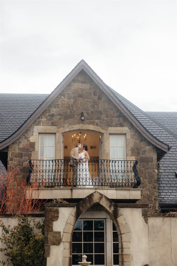 cute couple kissing during their bridal session
