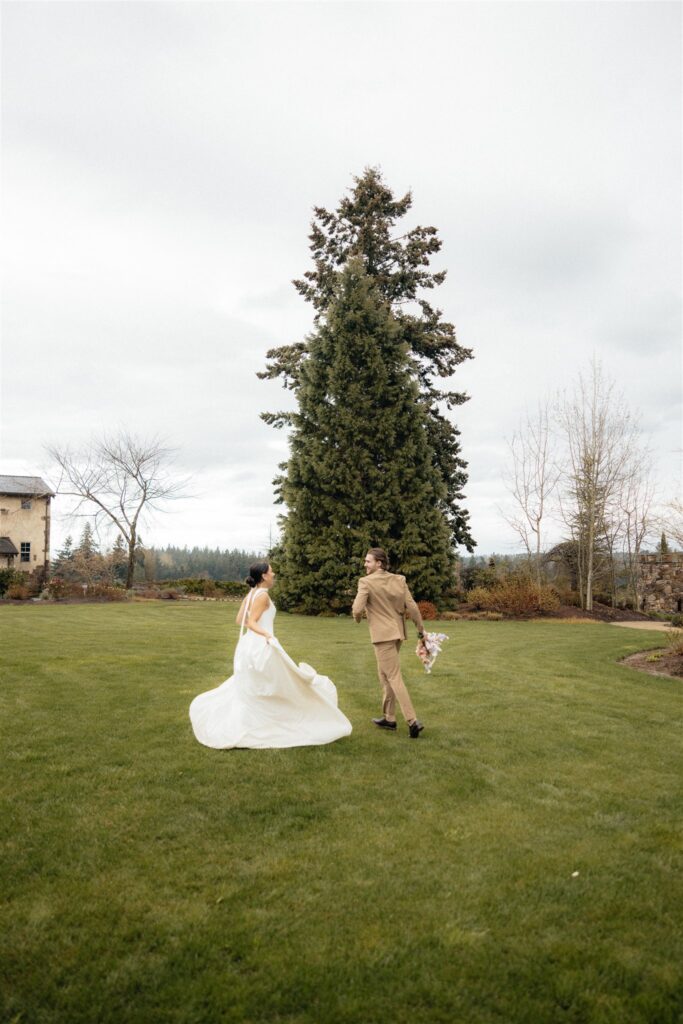 cute couple running around during their bridal session