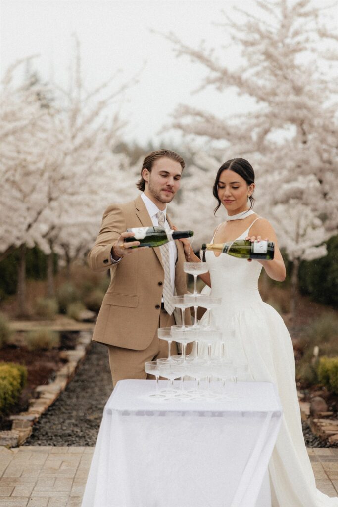 bride and groom celebrating their wedding day with champagne 