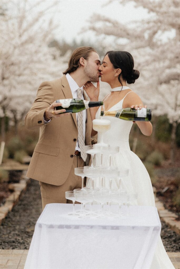 cute picture of the bride and groom kissing during their photoshoot