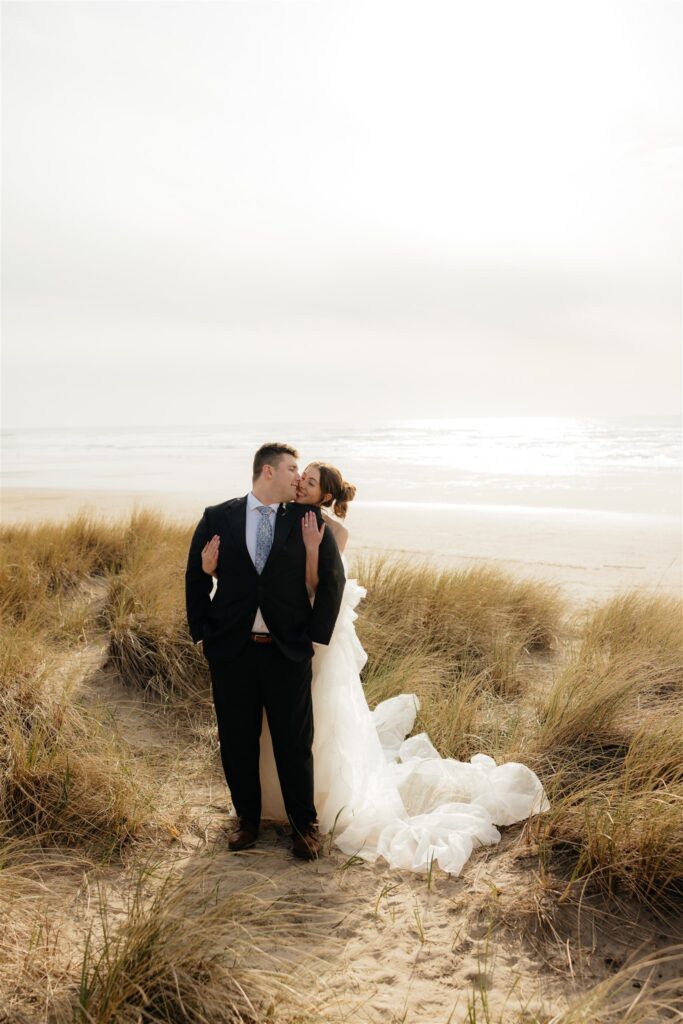 bride hugging the groom from the back during their photoshoot