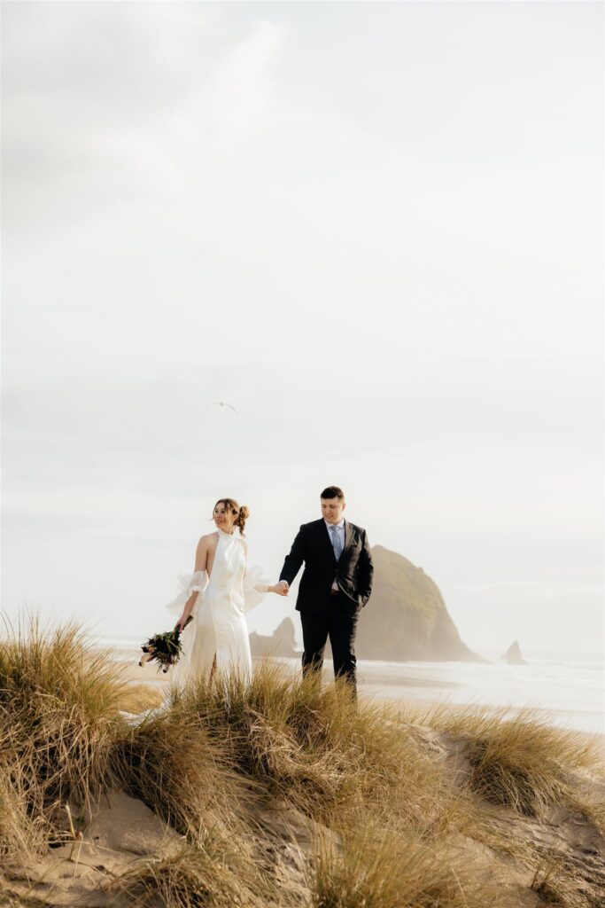 bride and groom holding hands during their bridal portraits 