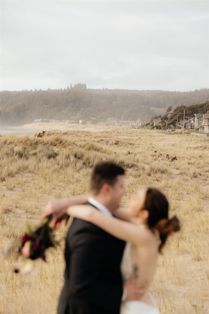 portrait of the newlyweds hugging 