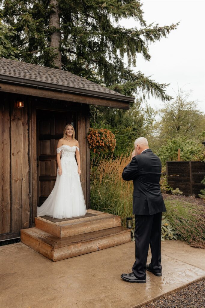 Emotional first look of the bride and her dad