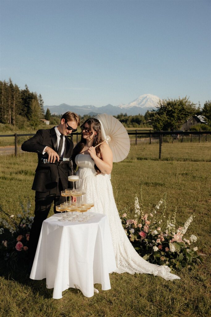 Couples celebrating their elopement with champagne