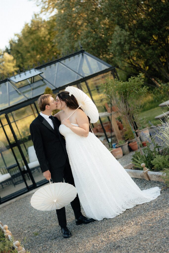 portrait of the newlyweds kissing 