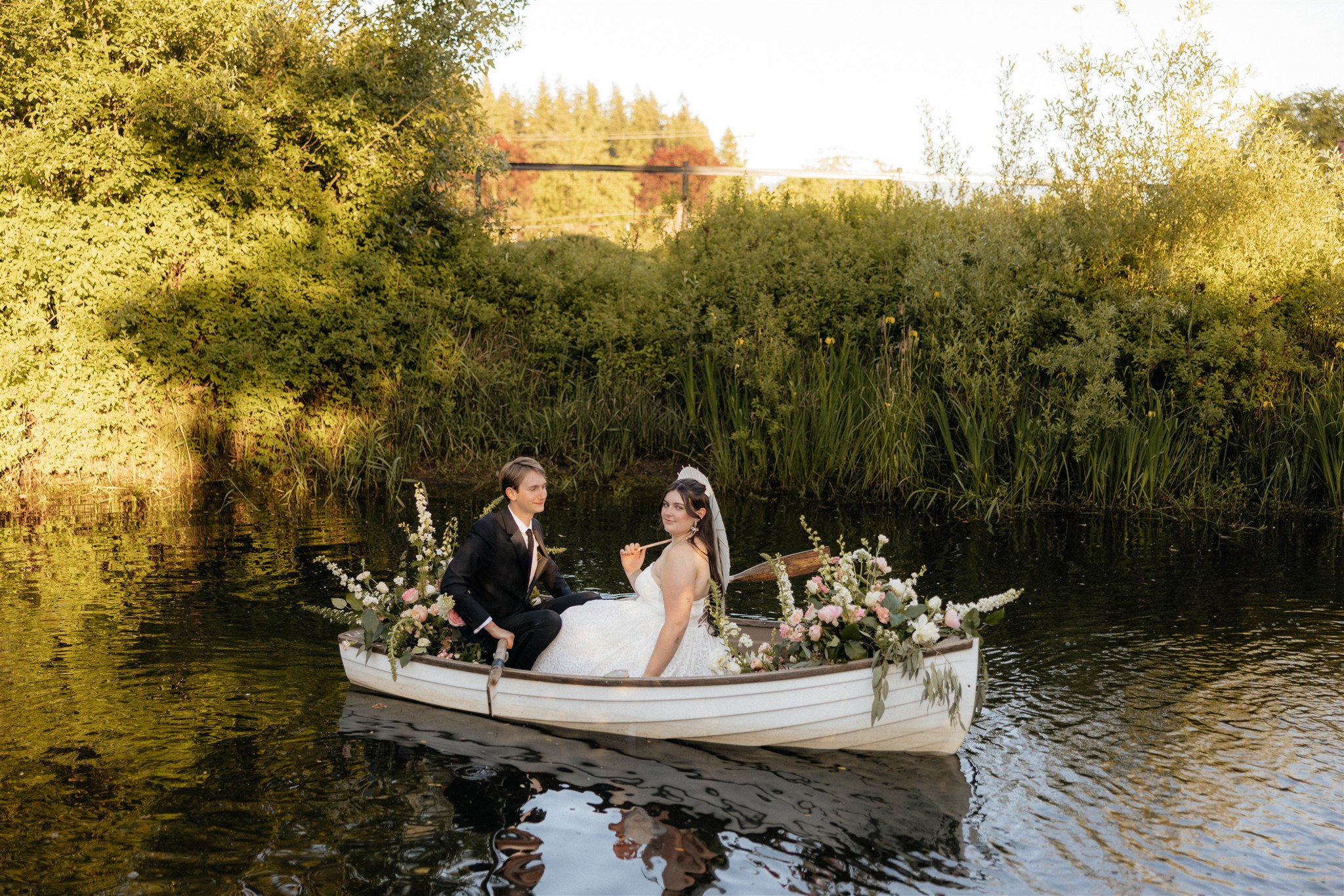 couple smiling at the camera during their bridal session