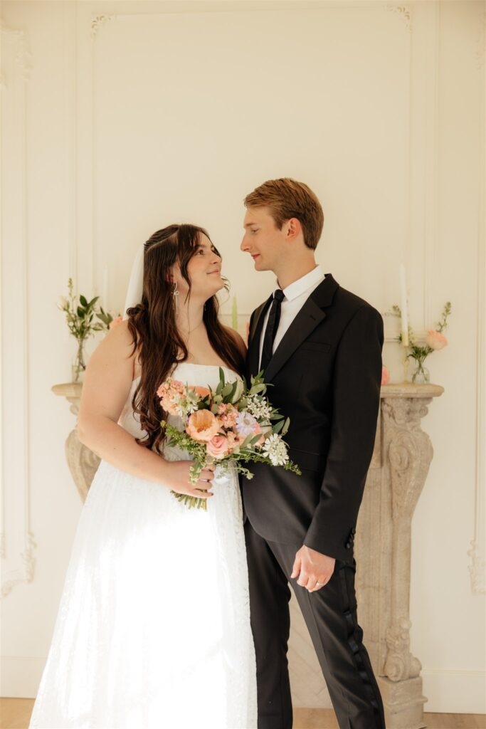 picture of the newlyweds smiling at each other