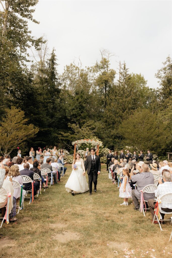 Picture of the newly married couple heading to the reception party