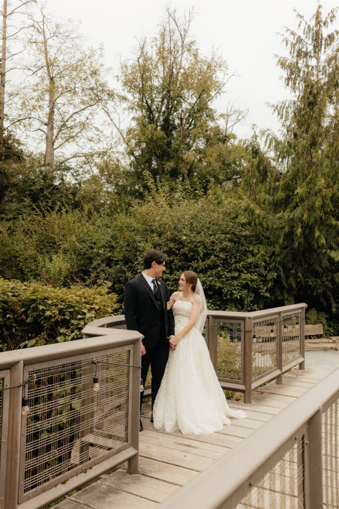 cute picture of the bride and groom, smiling at each other