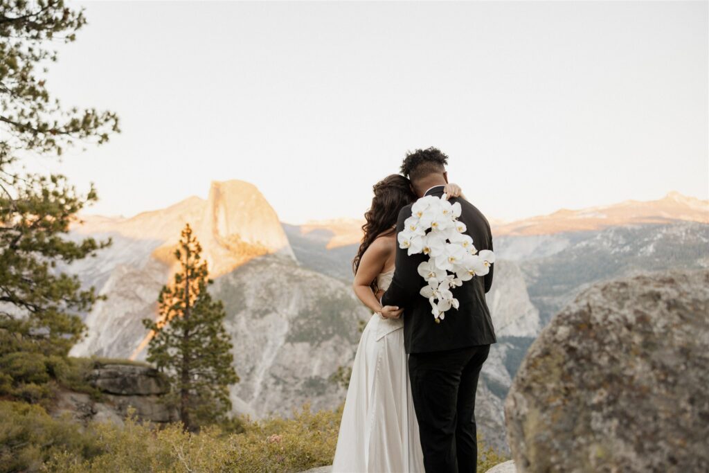 cute picture of the bride and groom hugging