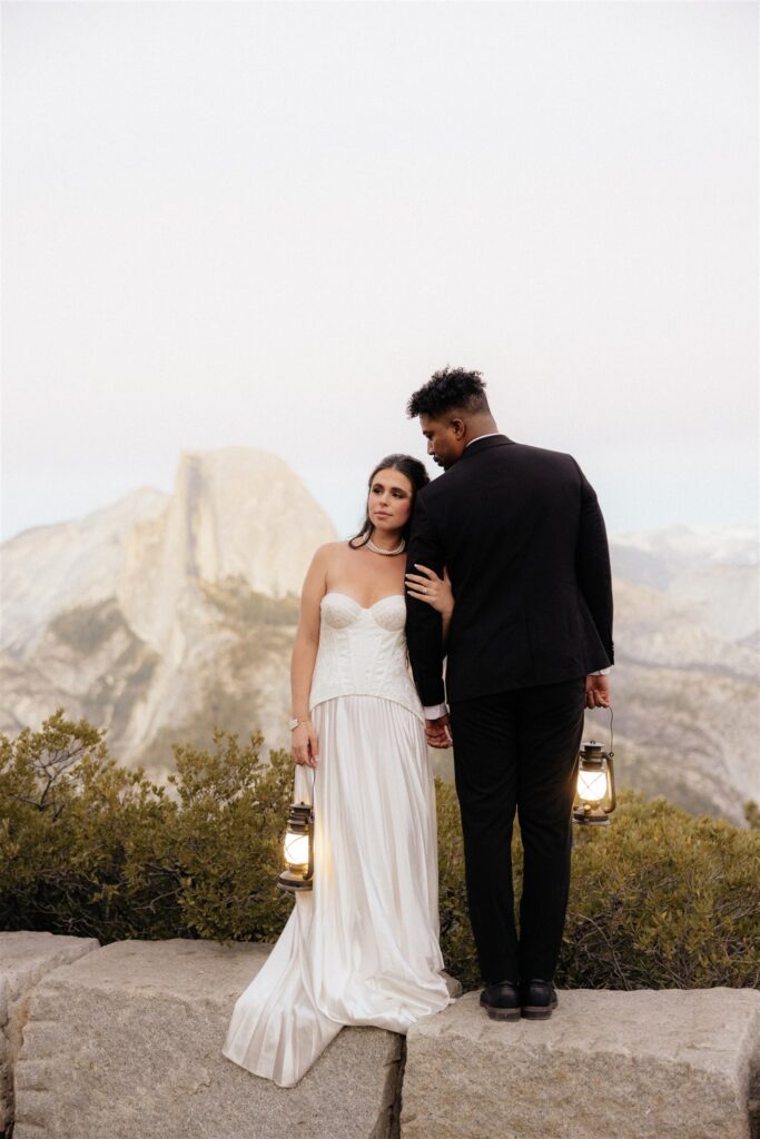cute portrait of the bride and groom holding hands
