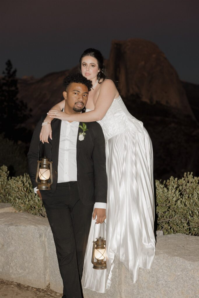 newlyweds hugging during their bridal portraits in yosemite