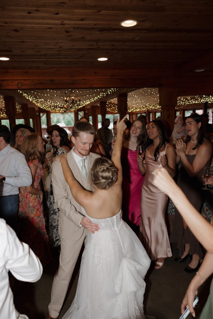 newlyweds dancing at their reception party