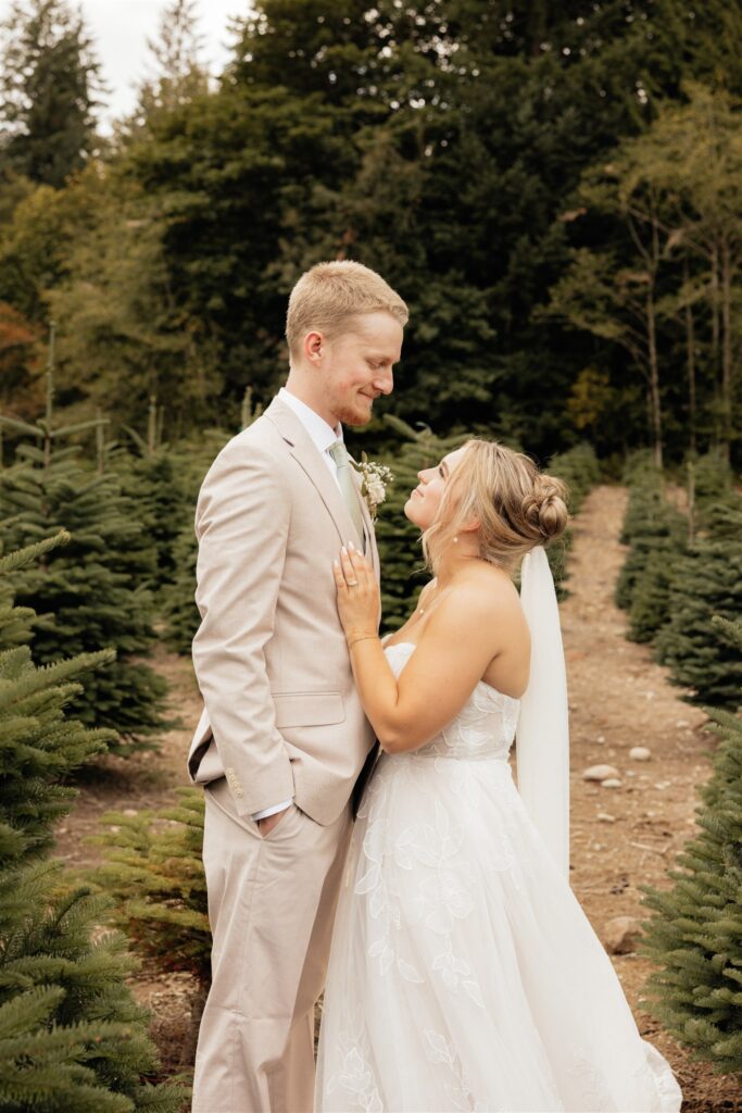 cute picture of the bride and groom smiling at each other