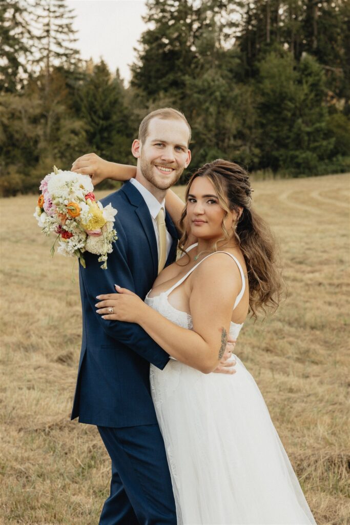 couple posing for the camera during their photoshoot