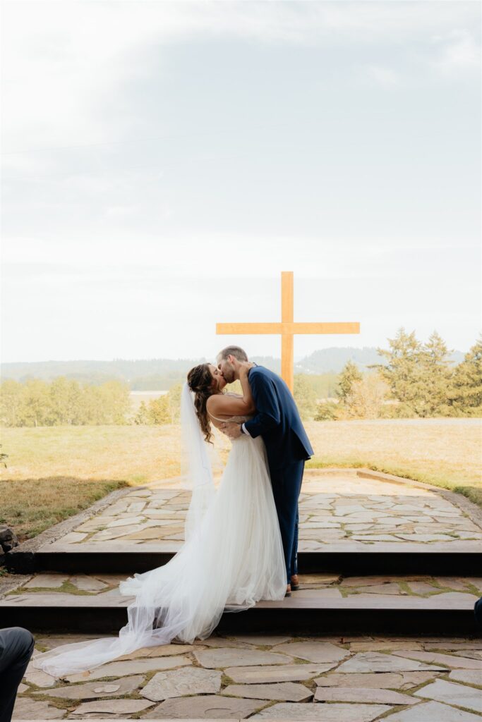 couple kissing after their ceremony