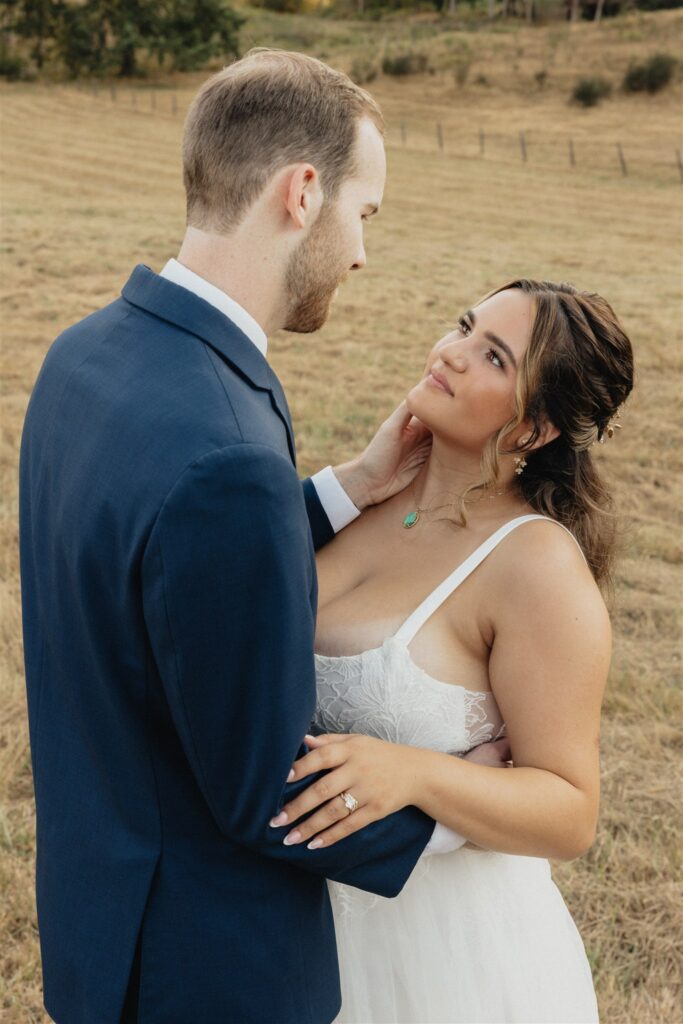 picture of the bride and groom smiling at each other