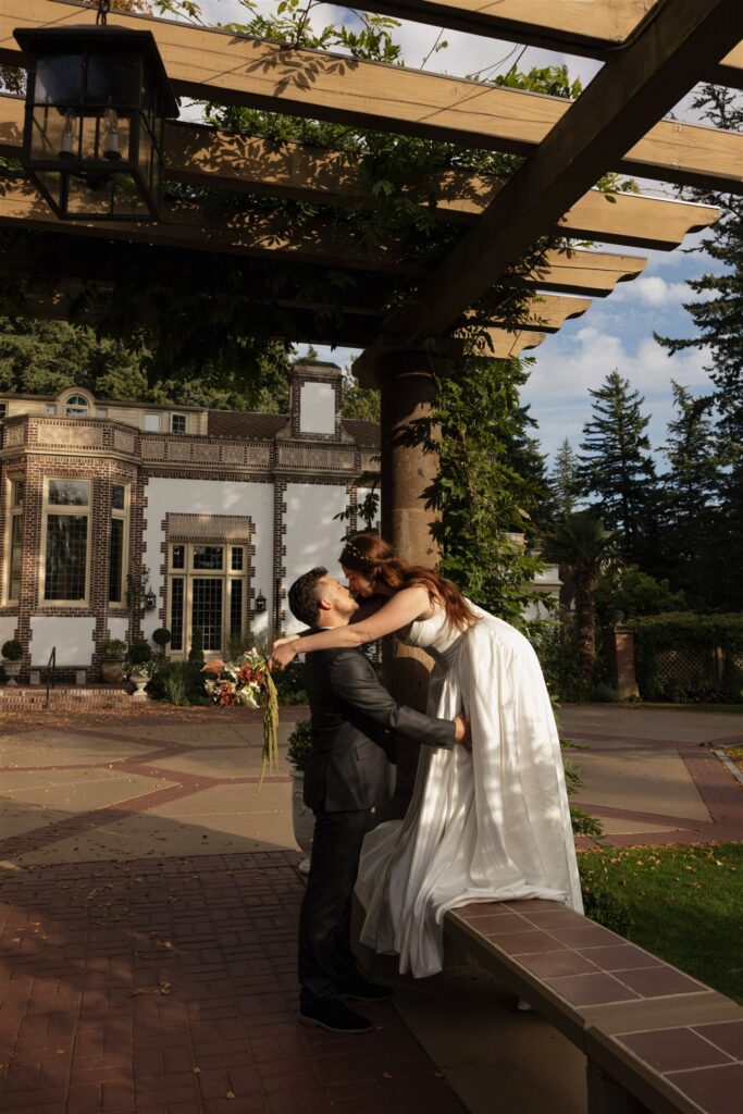 stunning picture of the newlyweds kissing