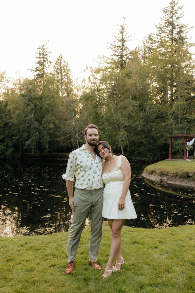 newlyweds smiling at the camera during their bridal portraits