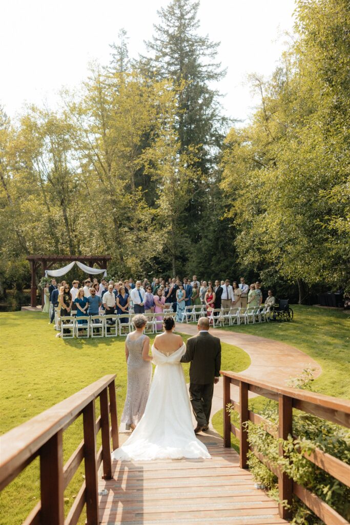 stunning picture of the bride walking down the aisle