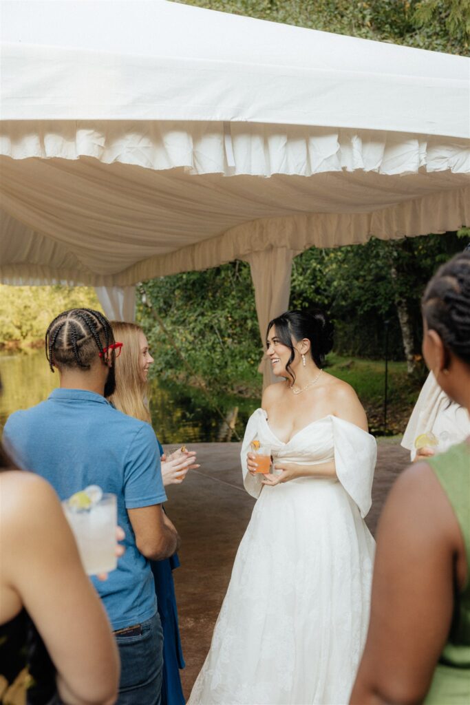 bride with her wedding guests at the wedding reception