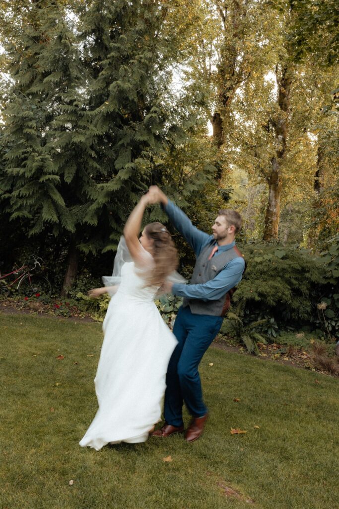cute picture of the newlyweds dancing during their bridal portraits