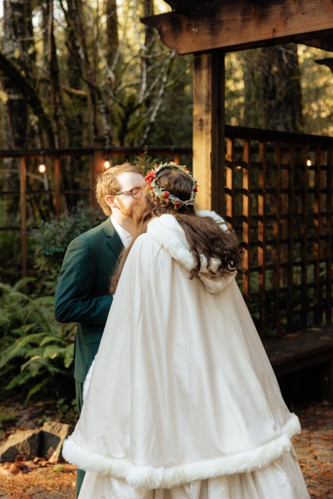 Bride and groom, kissing after their first look