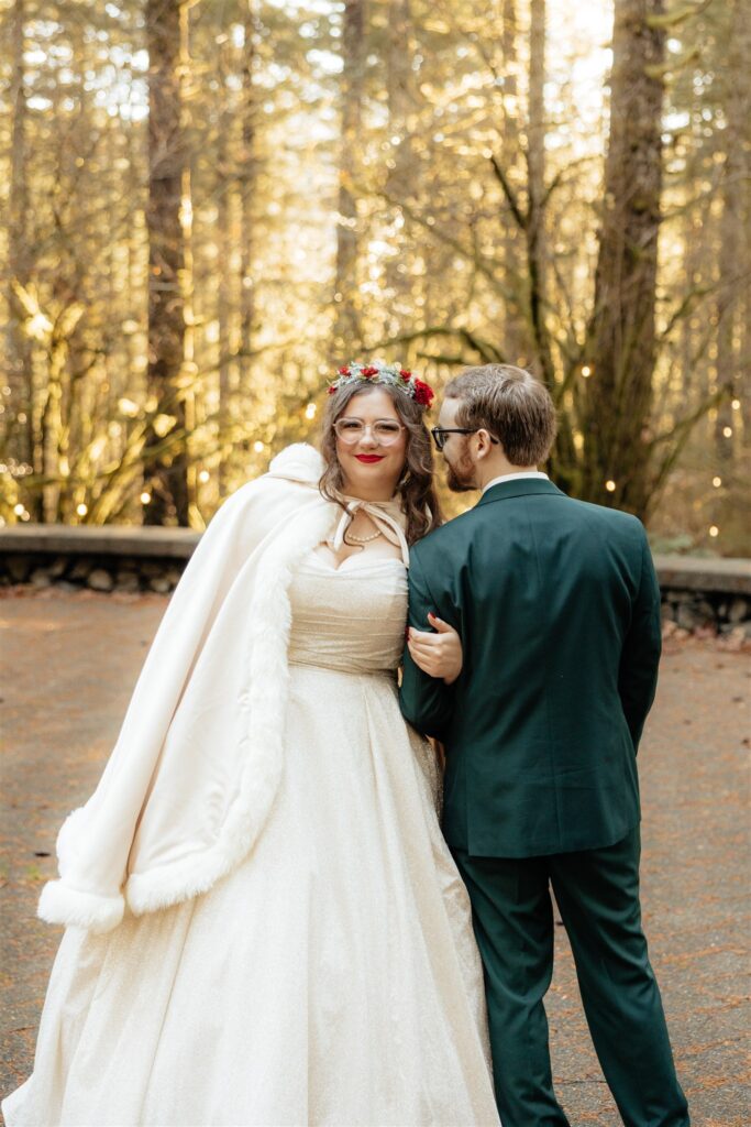 Groom, kissing the bride on the cheek