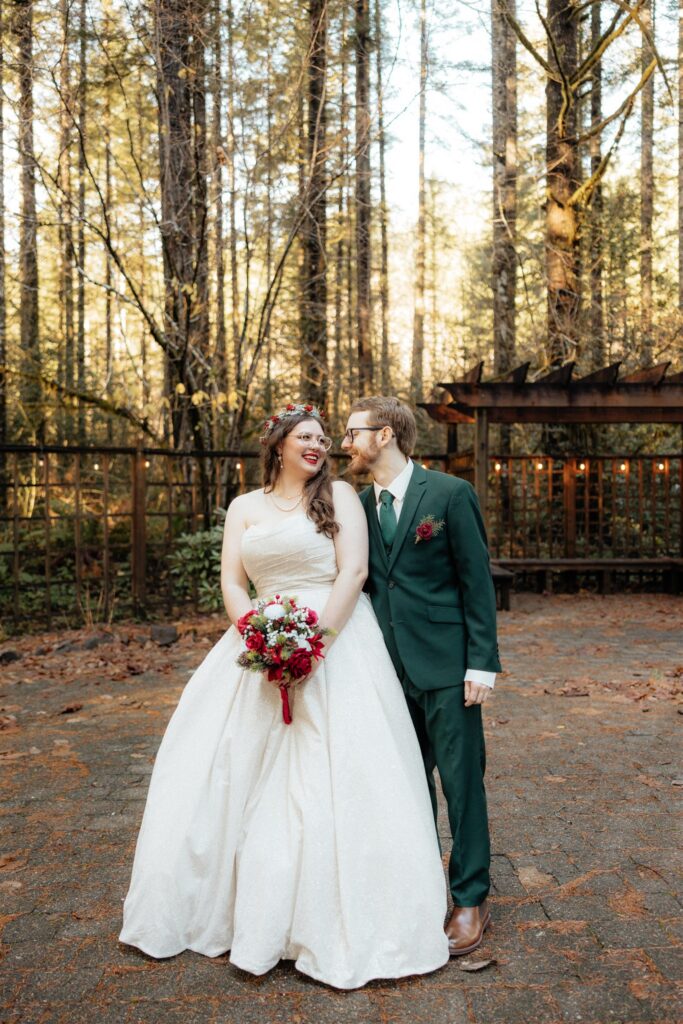 Groom, kissing the bride on the forehead