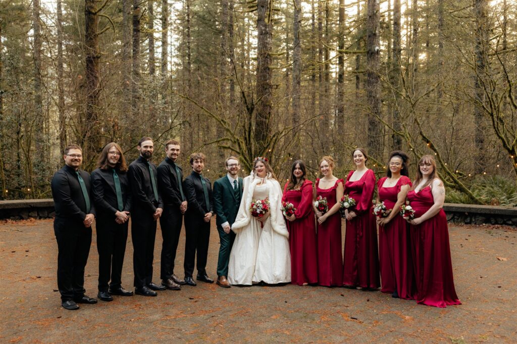 Cute picture of the newly married couple with their bridal parties