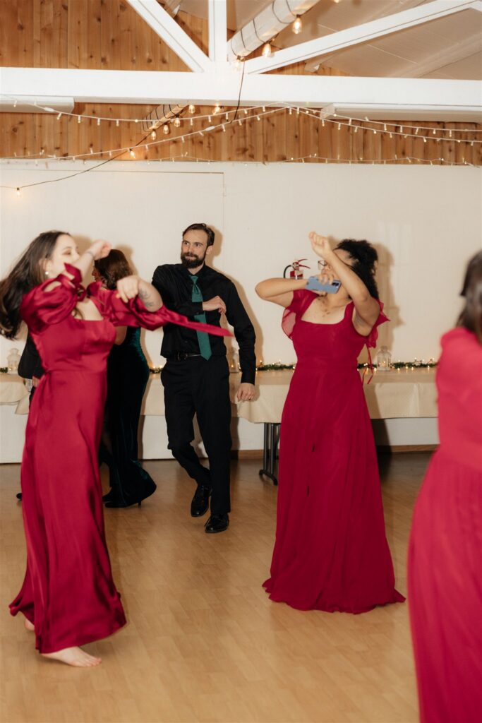 Guests dancing at the wedding reception party