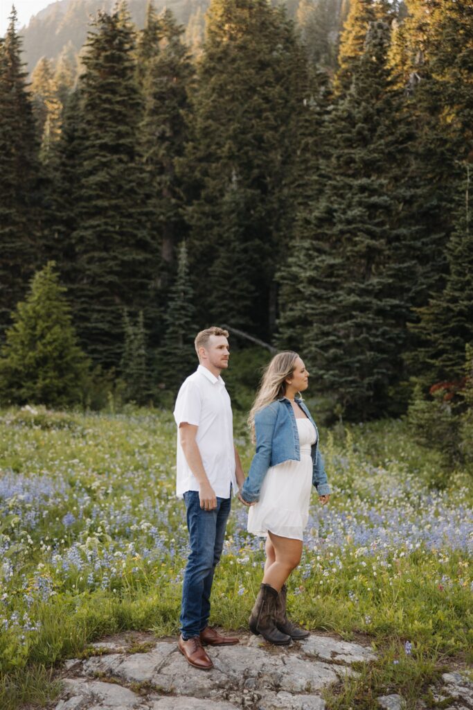 cute picture of the newly engaged couple smiling at each other