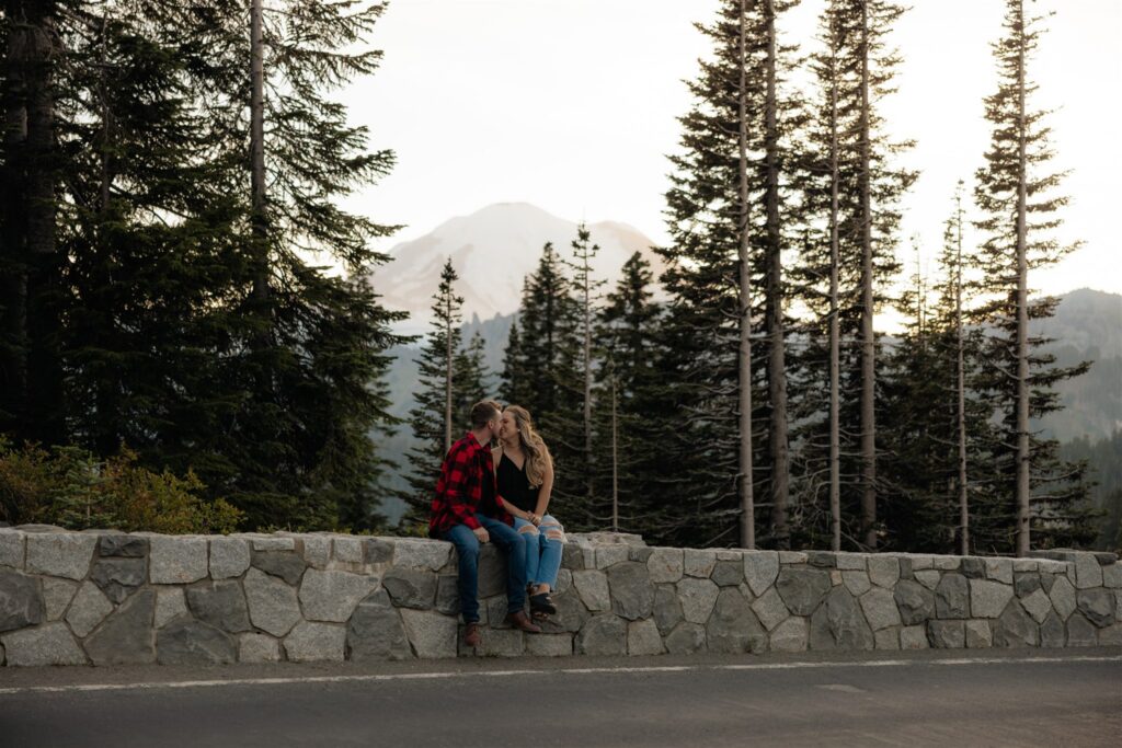 cute picture of the newly engaged couple kissing