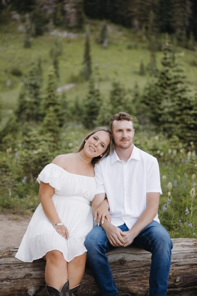 couple smiling at the camera during their photoshoot