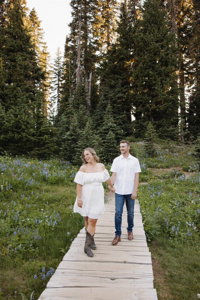 couple smiling at the camera during their photoshoot