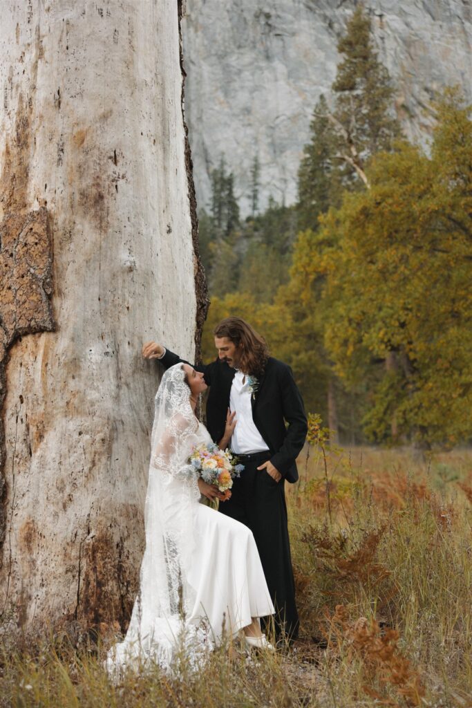 Bride and groom, laughing with each other during their bridal portraits