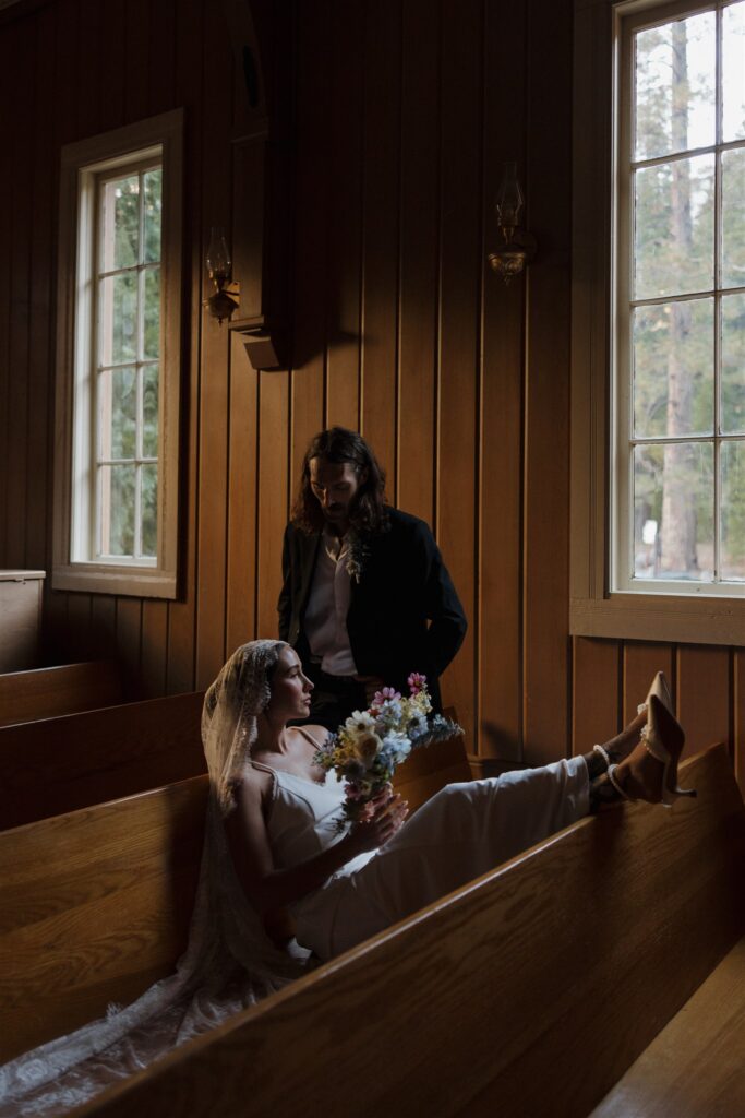 Picture of the newly married couple smiling at each other