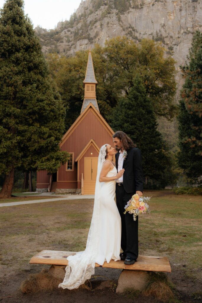 Picture of the newly married couple kissing