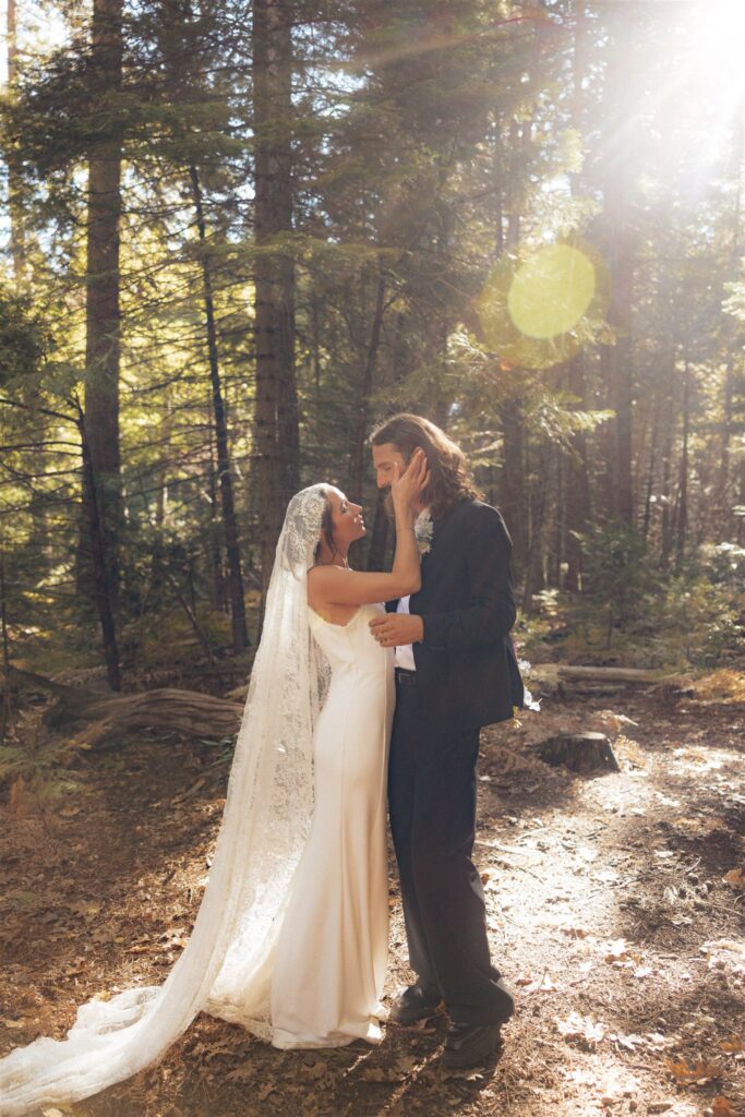 Picture of the bride and groom, smiling at each other