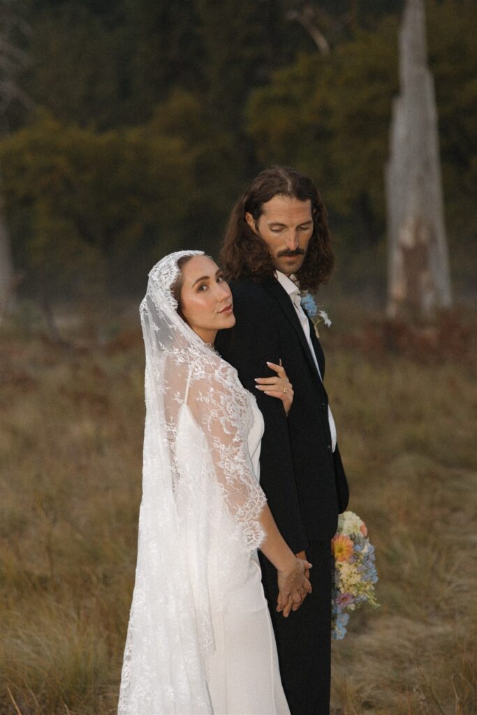 Cute picture of the newlyweds holding hands