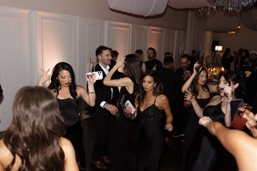 newlyweds at their fun wedding reception party