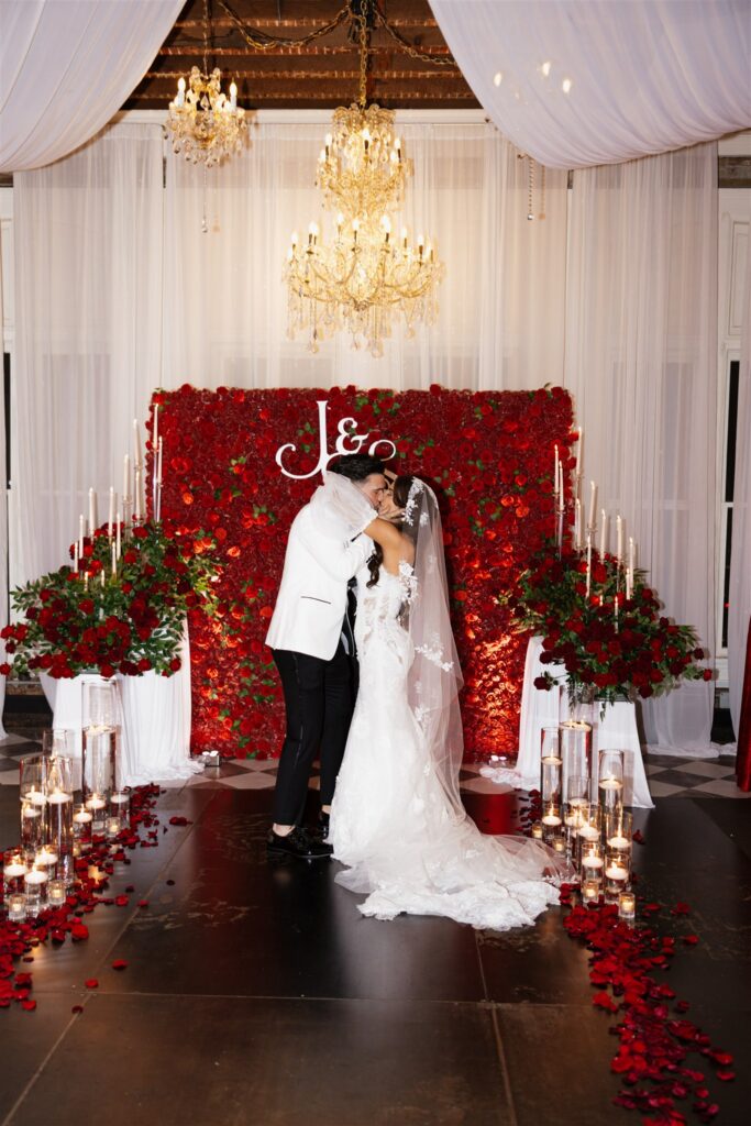 bride and groom kissing after their ceremony